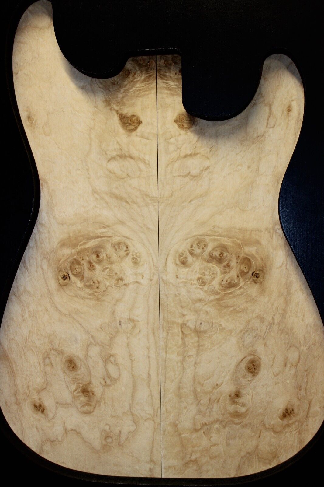 Silver maple, burl / lace figured guitar book matched top.