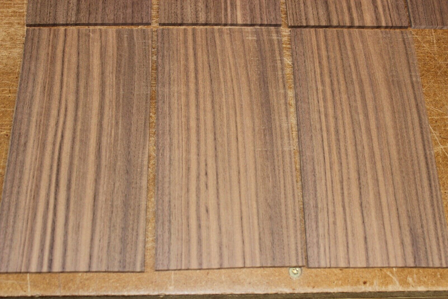 Quarter sawn black walnut headstock / peg head veneer. Sold individually