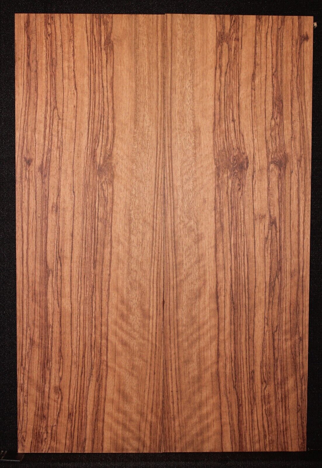 Figured quarter sawn bubinga guitar drop top.