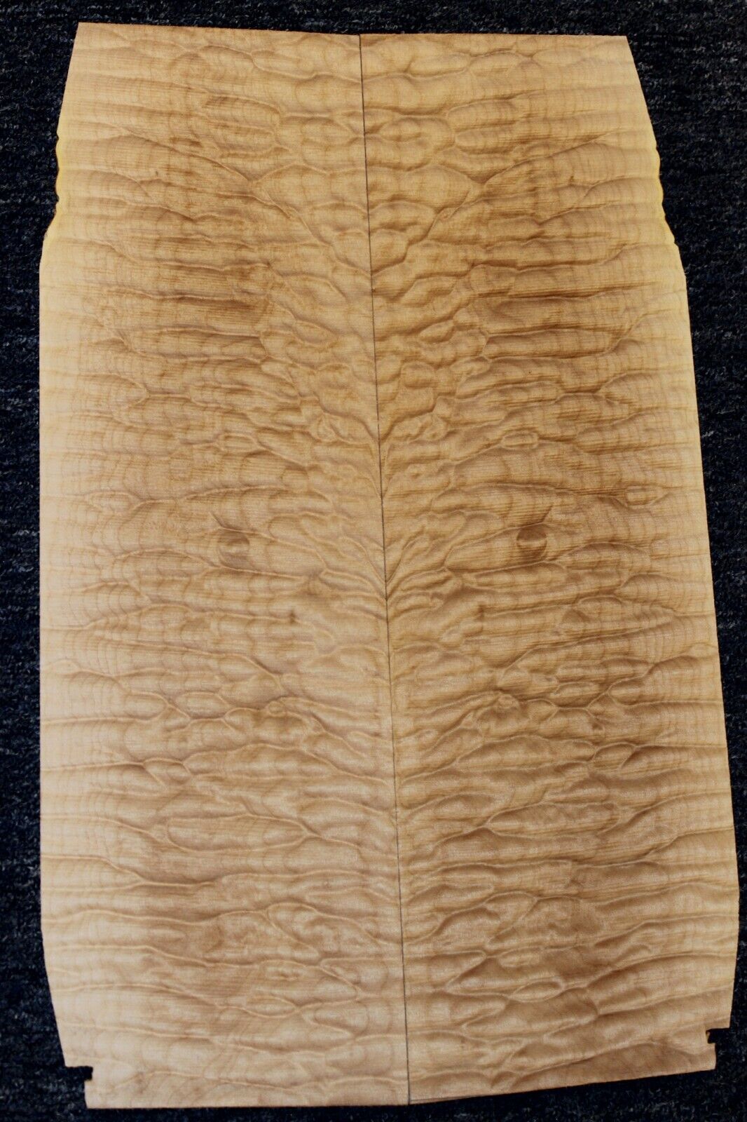 Quilted maple book matched guitar drop top. 5A figure