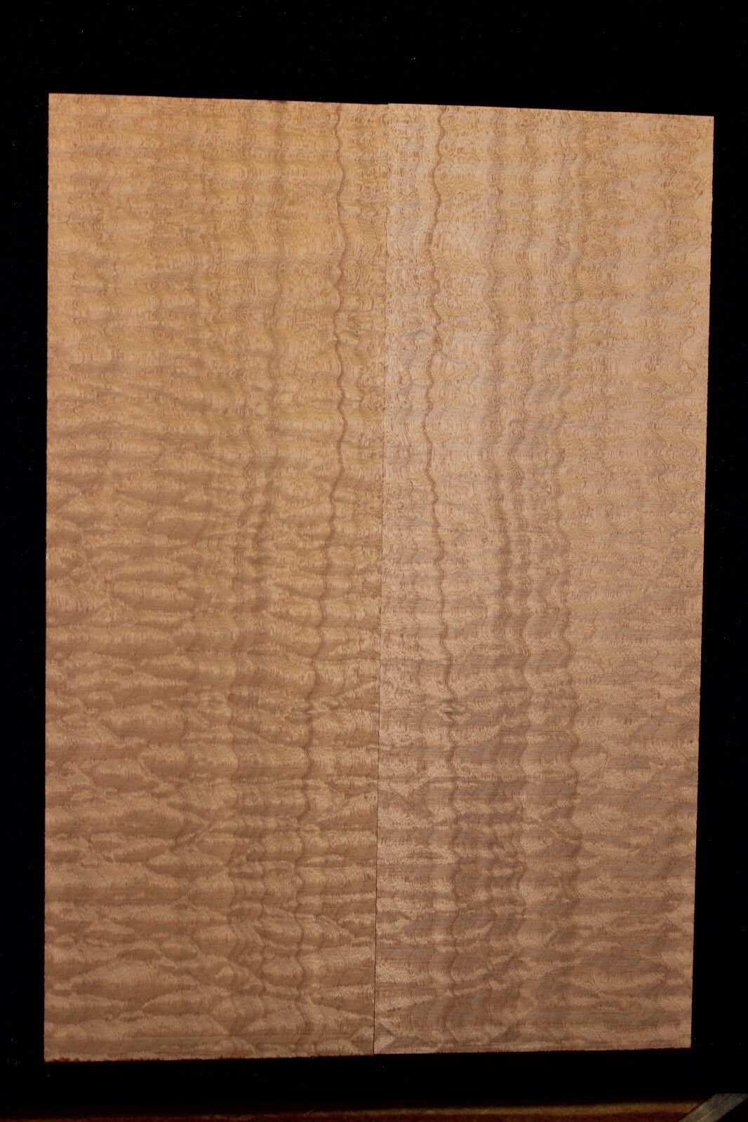 Quilted sapele electric guitar bookmatched drop top. Master grade figure.