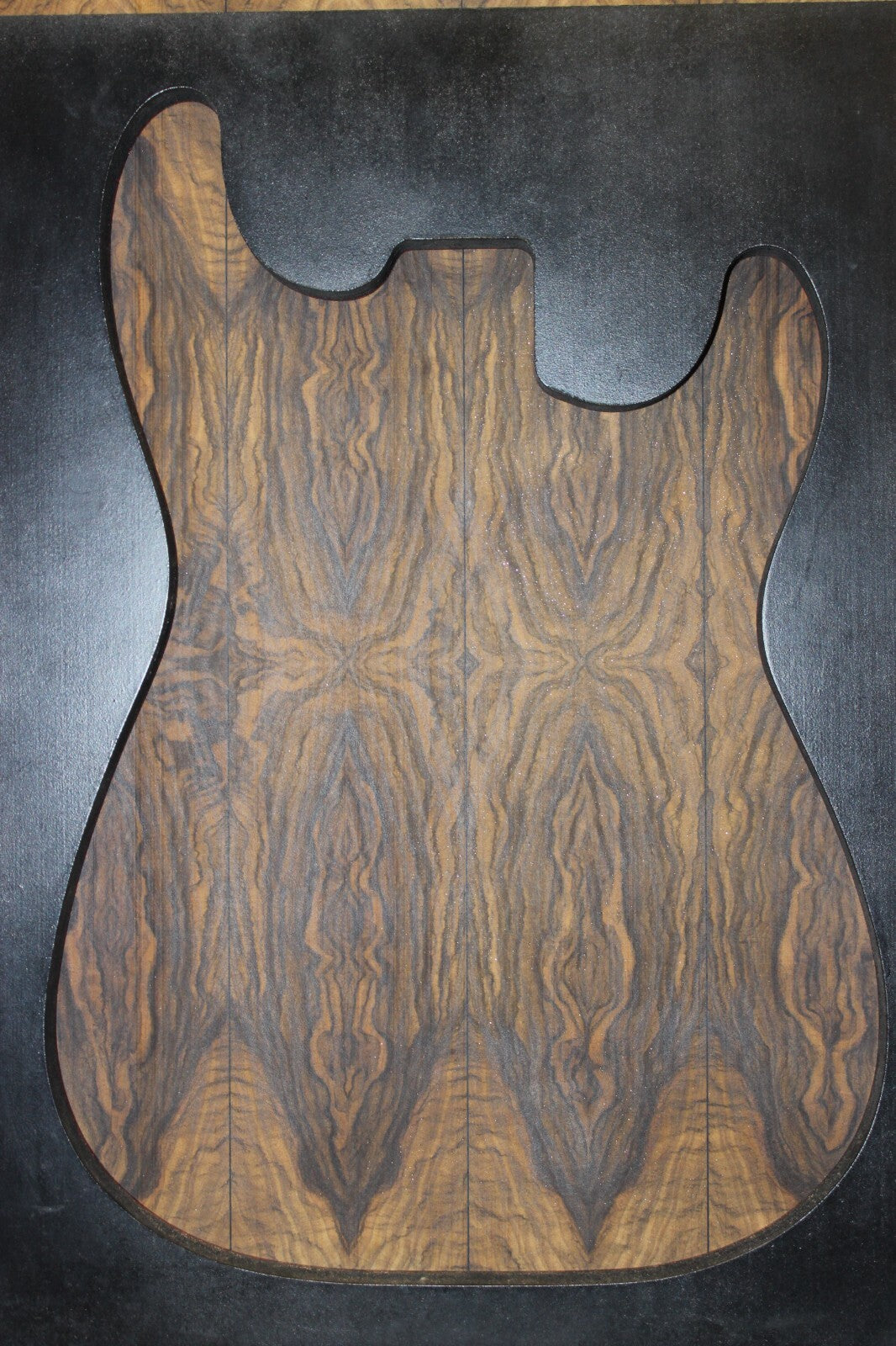 Multi book match black limba END GRAIN electric guitar top.