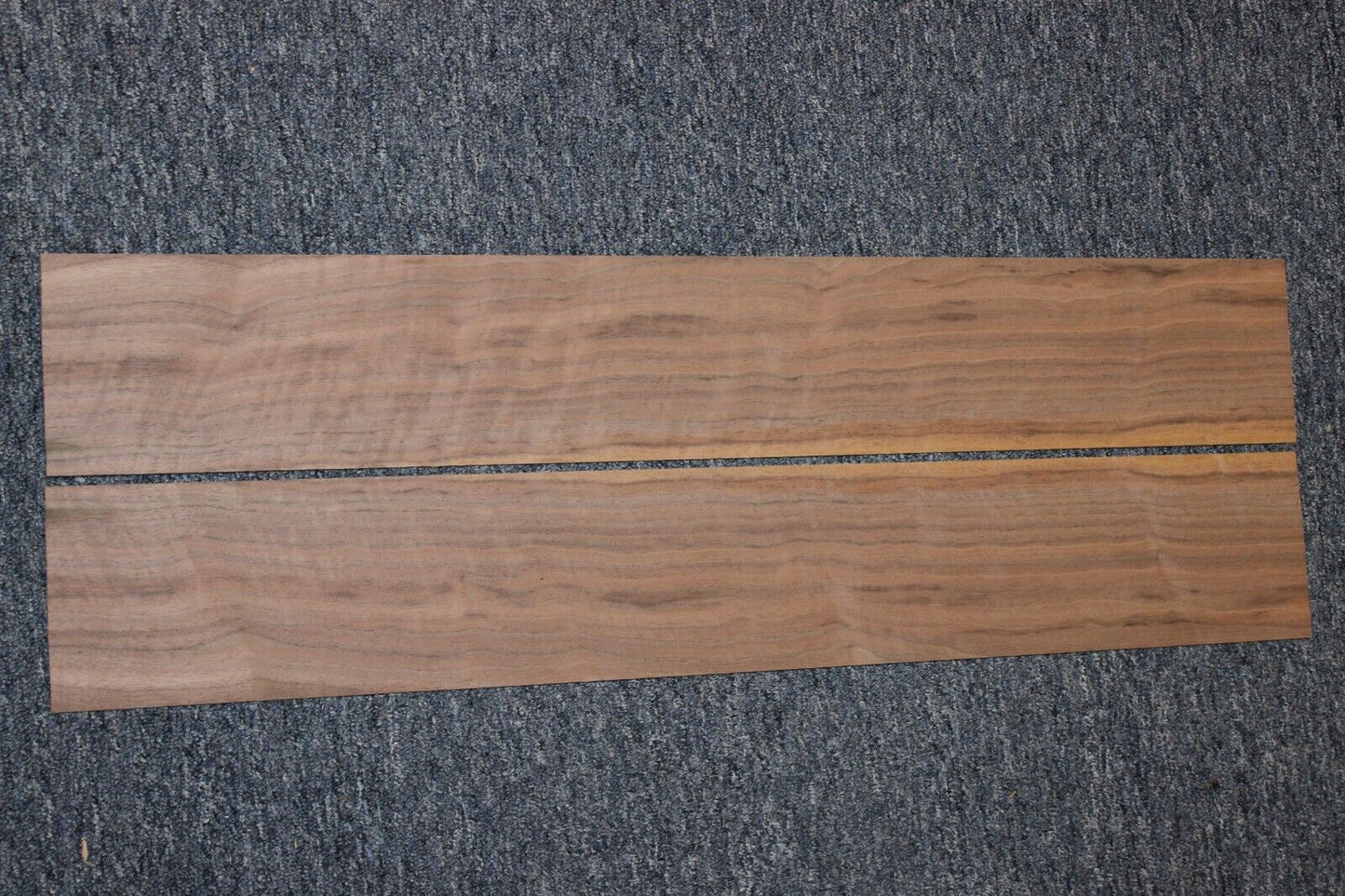Flame figured black walnut dreadnought size guitar back and side set.