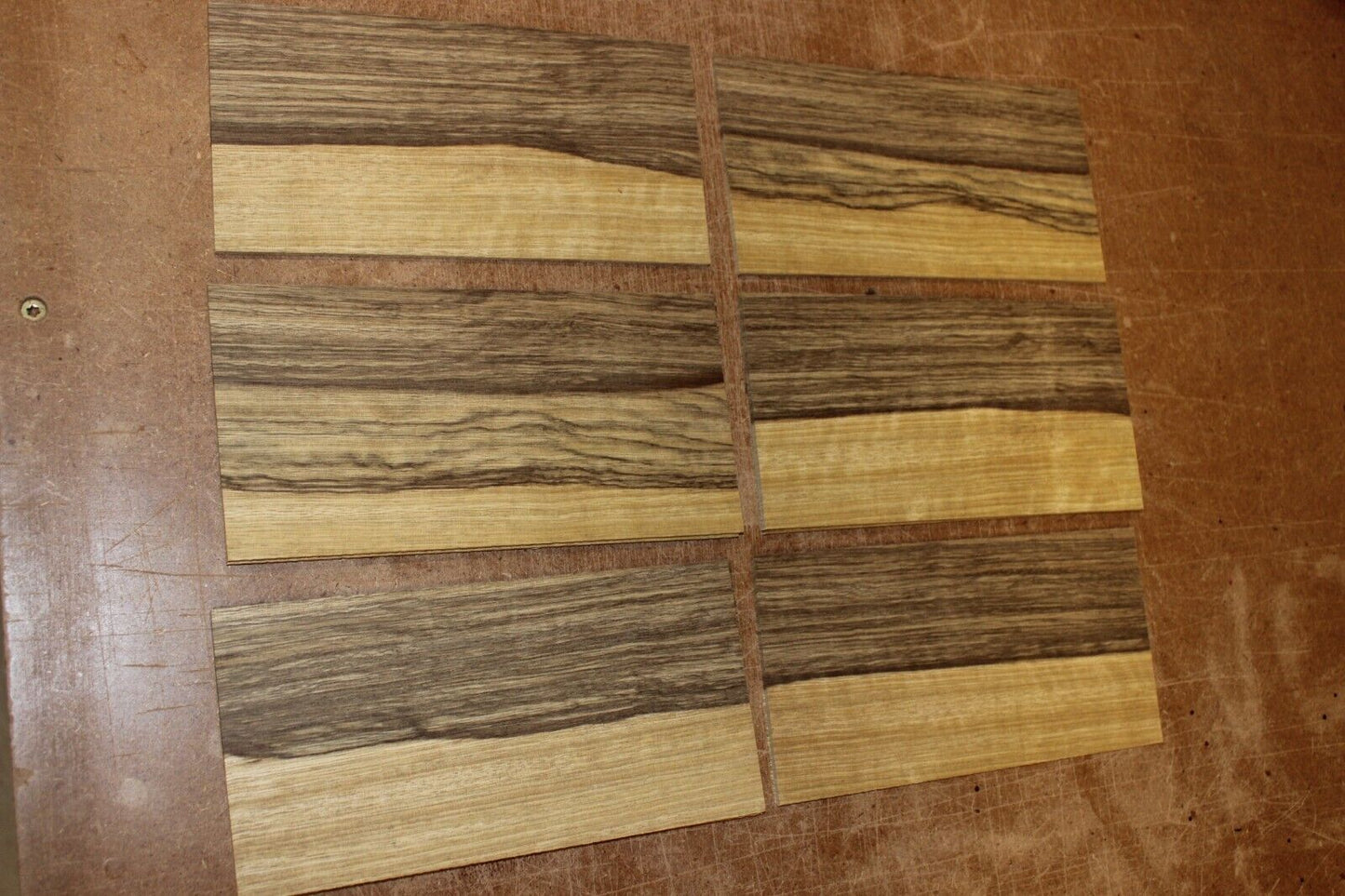 Quarter sawn black limba, korina headstock / peg head veneer. Sold individually