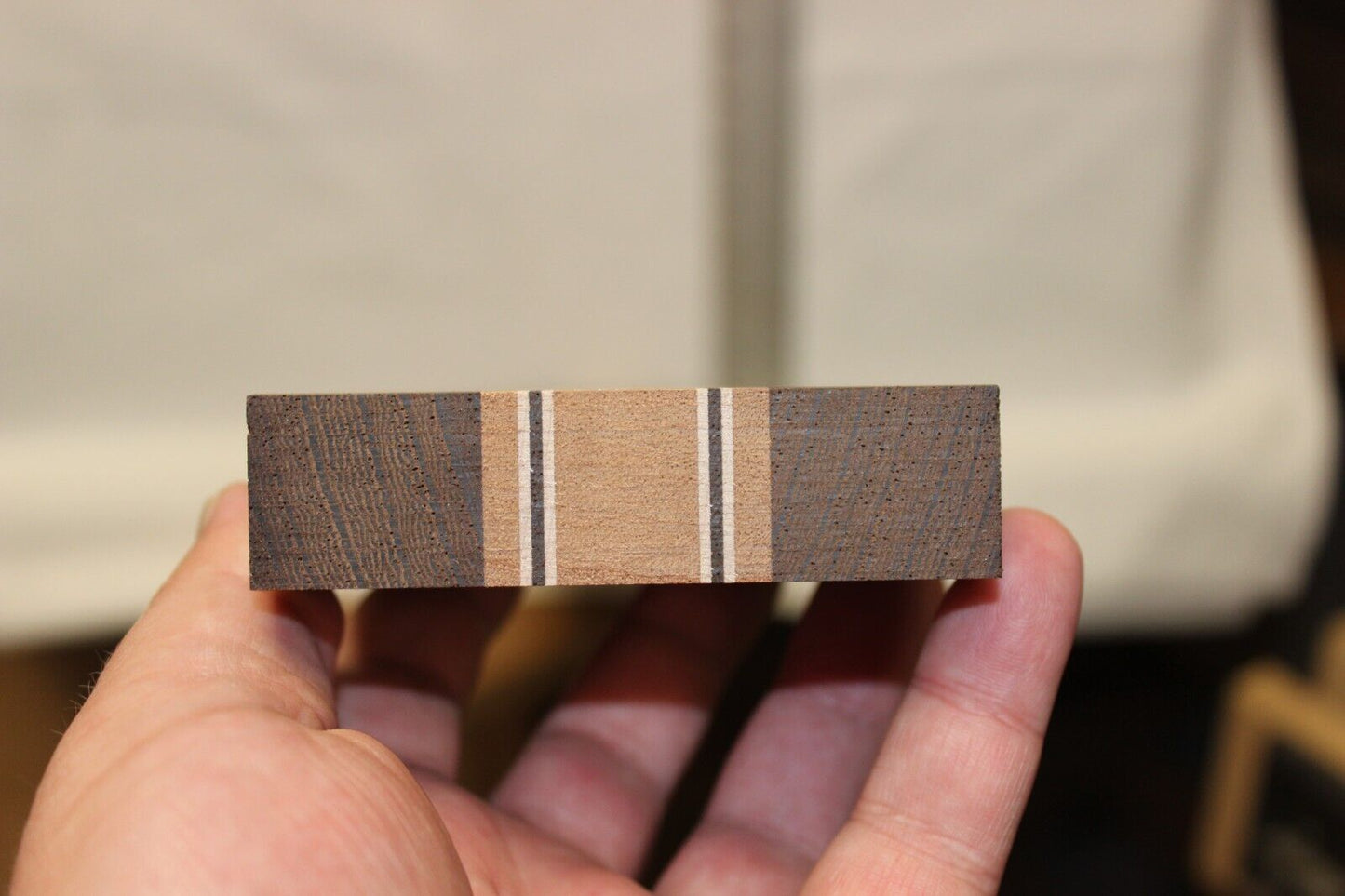 Quilted sapele, wenge and flame maple laminated guitar neck blank.