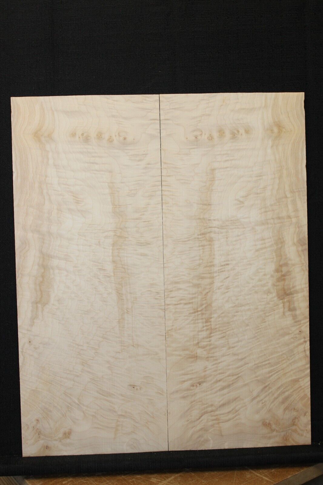 Quilted maple guitar drop top. Nice figure/with minor flaws.