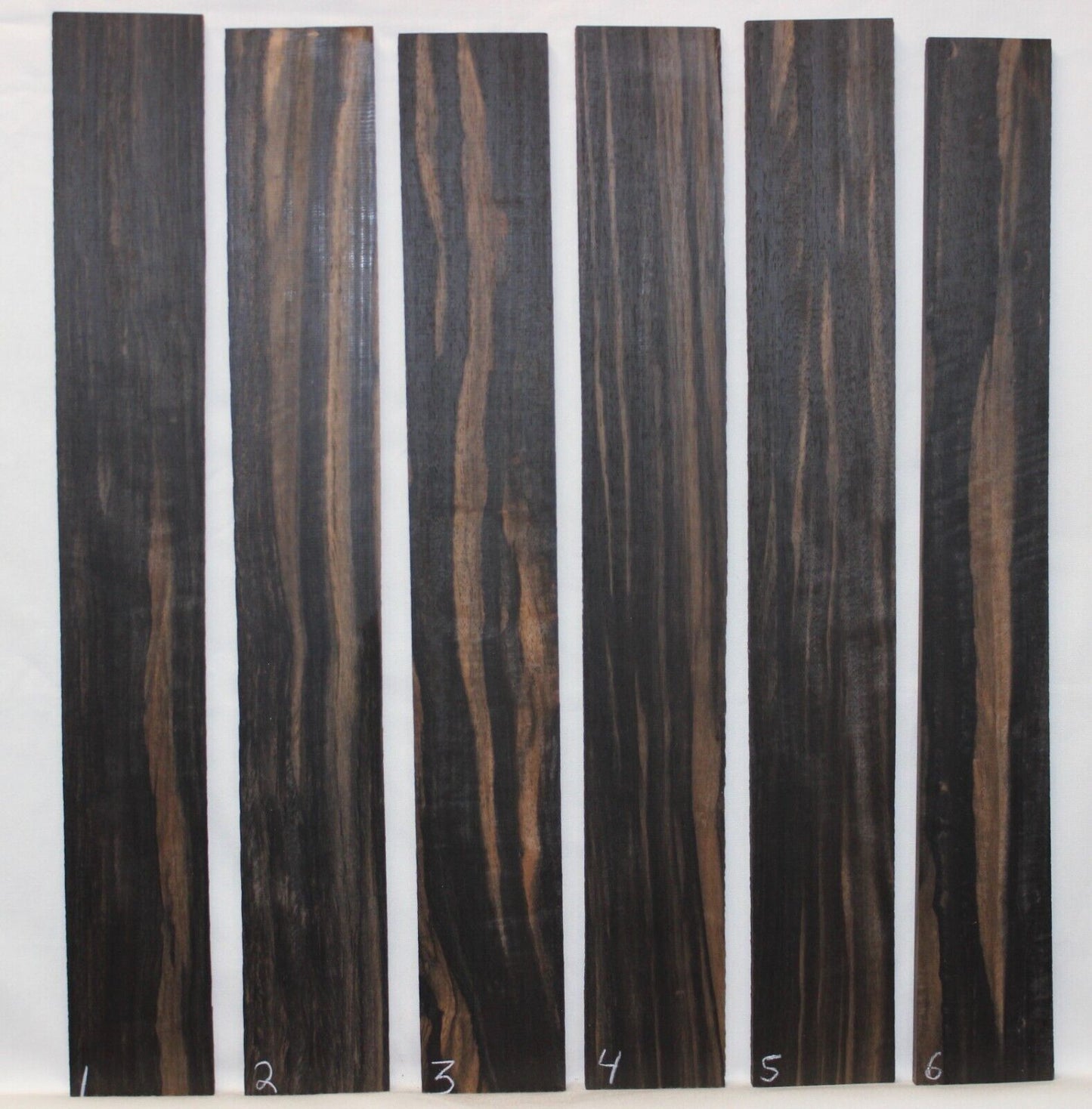 Gaboon ebony guitar fingerboard blanks. Wild color, pale moon ebony like look.