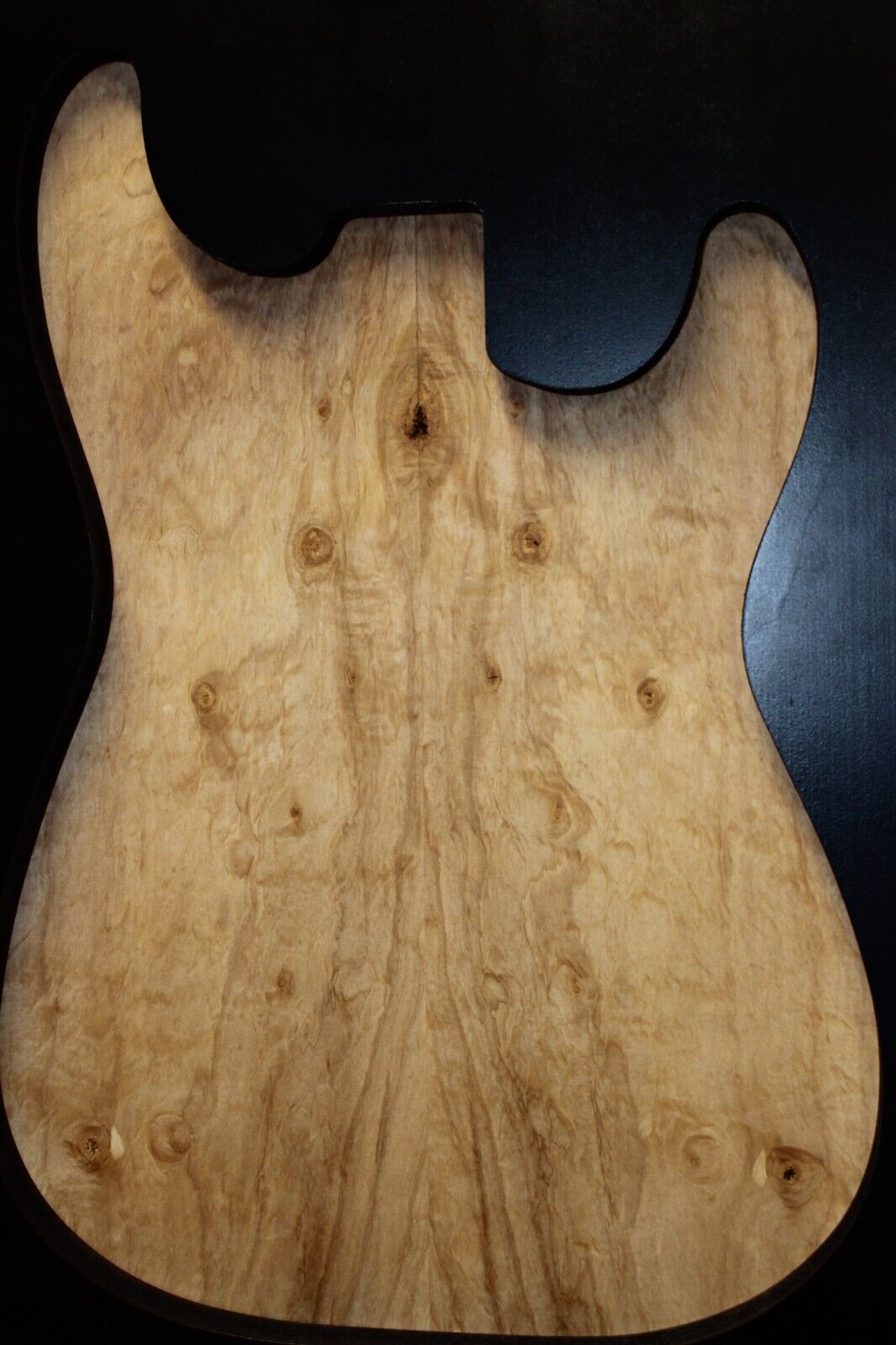 Silver maple, burl / lace figured guitar book matched top.