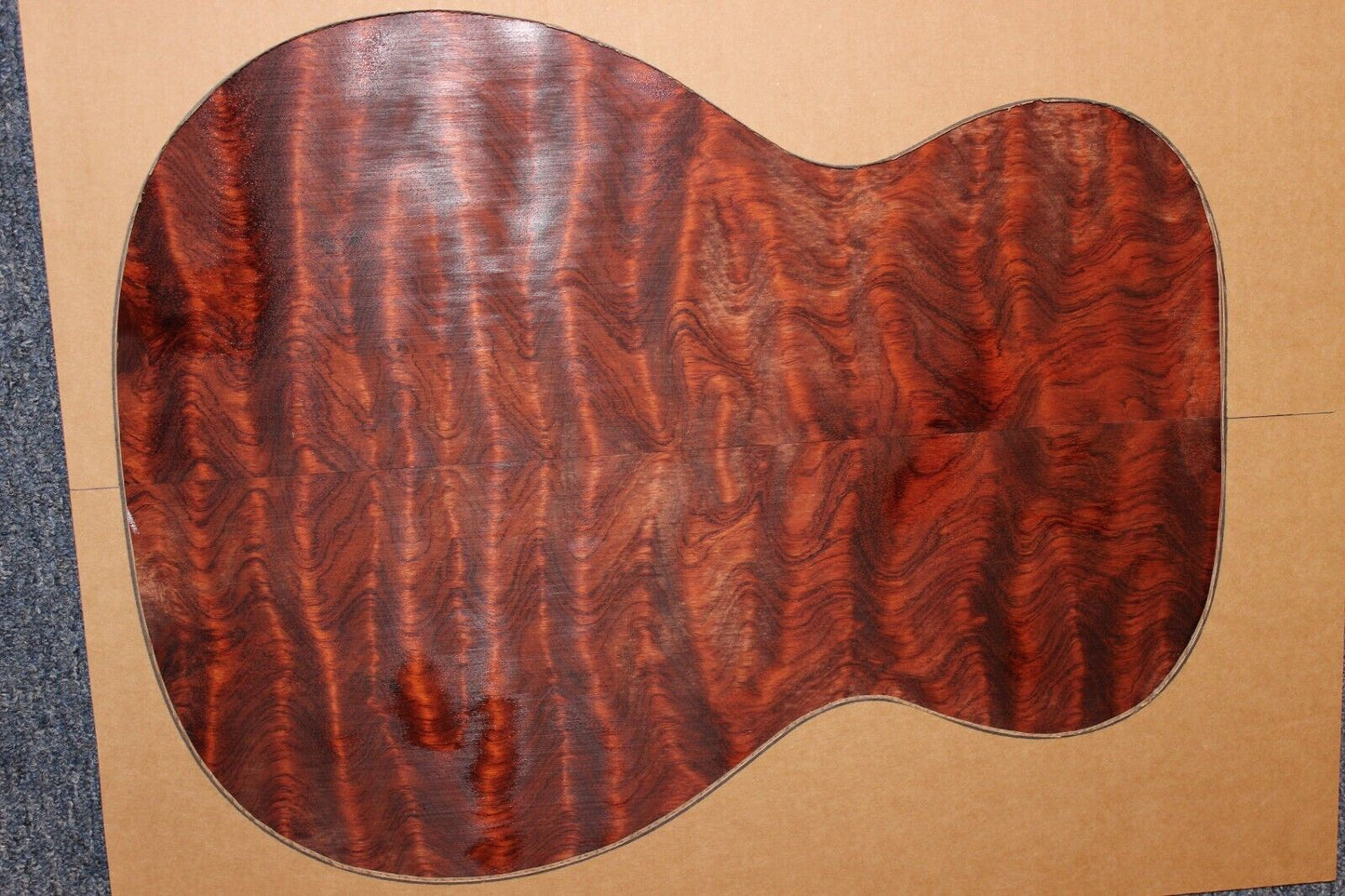 Waterfall figured bubinga back and side set. Stunning grain, color and figure.