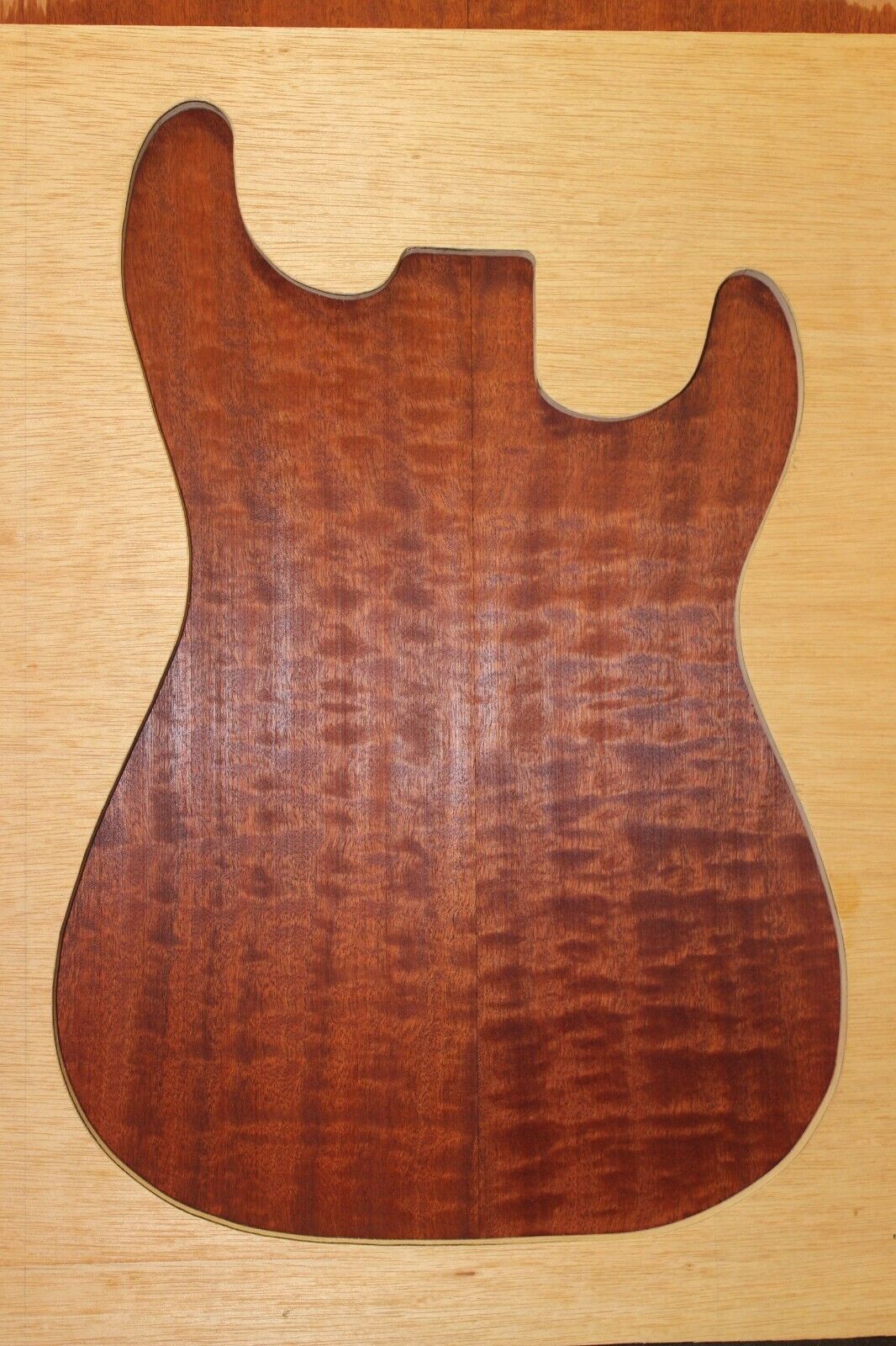Figured sapele guitar bookmatched drop top.