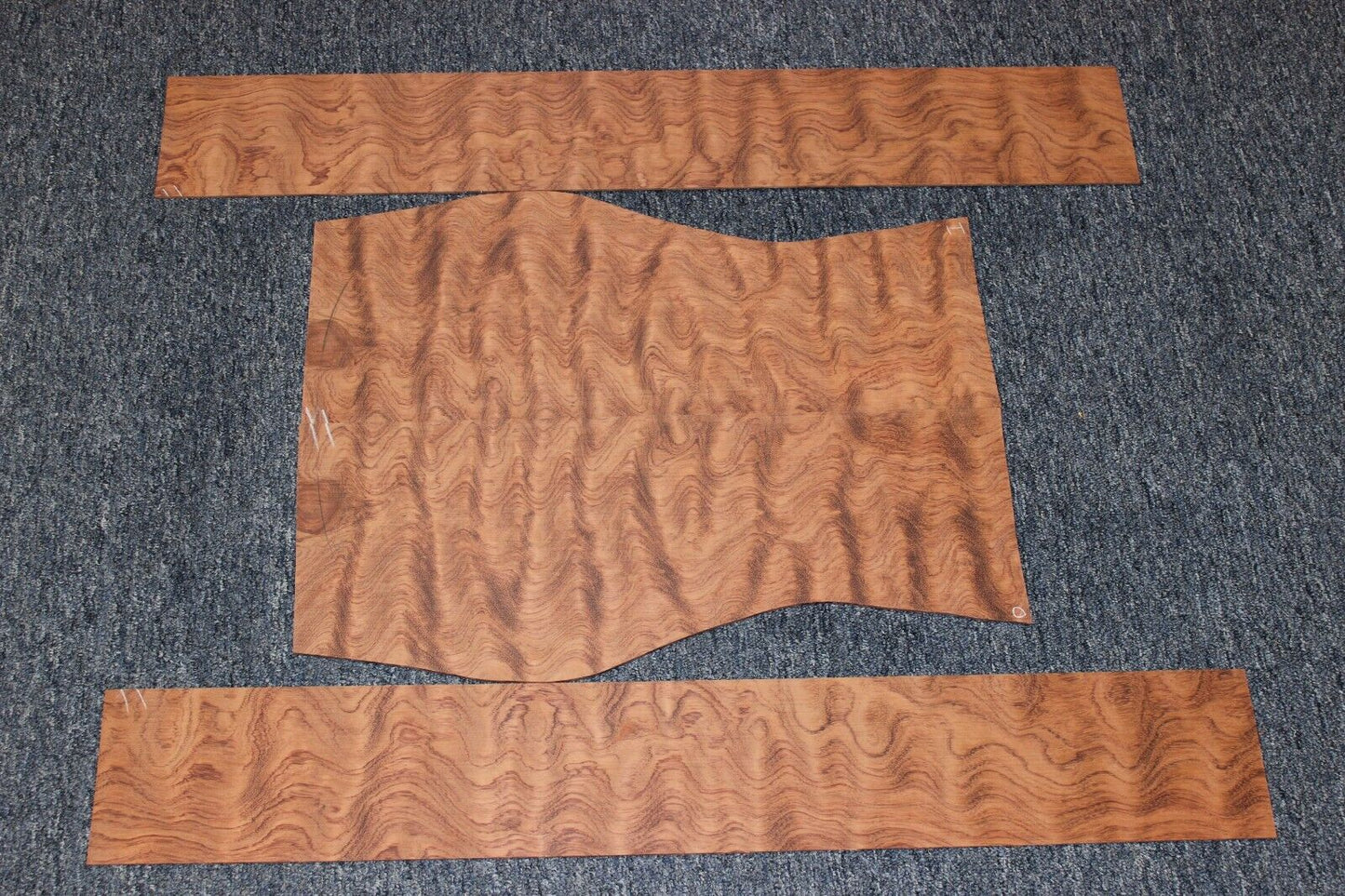 Waterfall figured bubinga back and side set. Stunning grain, color and figure.