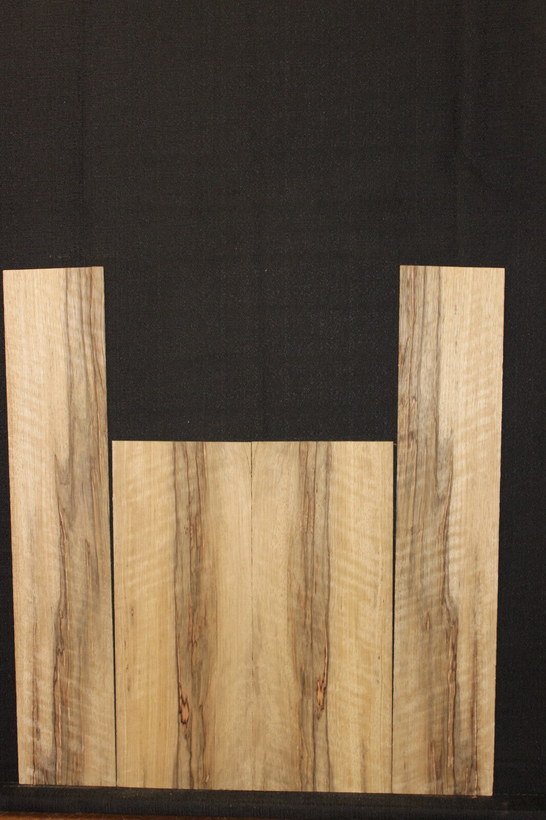 Quarter sawn black limba / korina ukulele back and side set. Tenor size