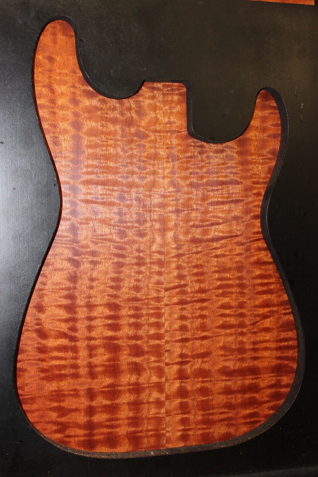 Quilted figured Sapele book matched guitar carve top.