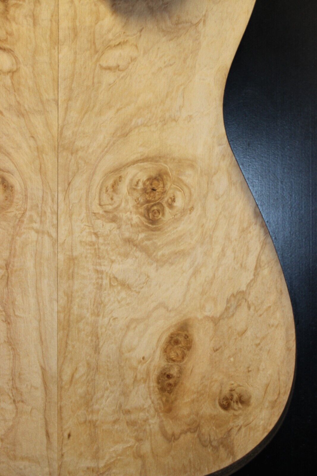 Silver maple, burl / lace figured guitar book matched top.