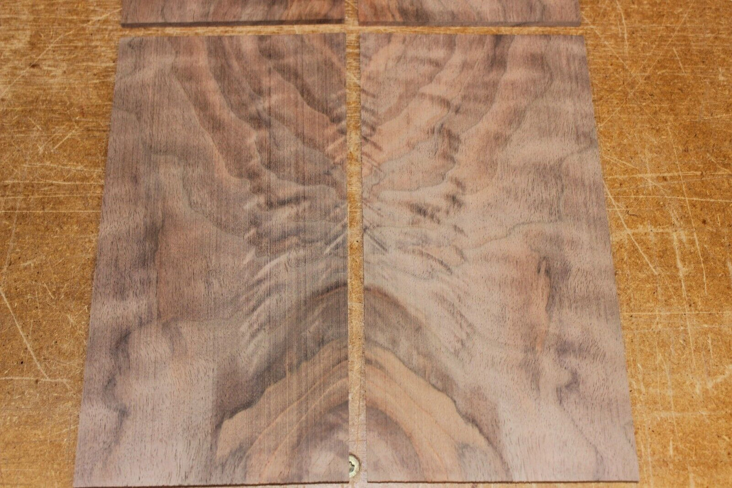 Figured black walnut headstock / peg head veneer. Sold individually