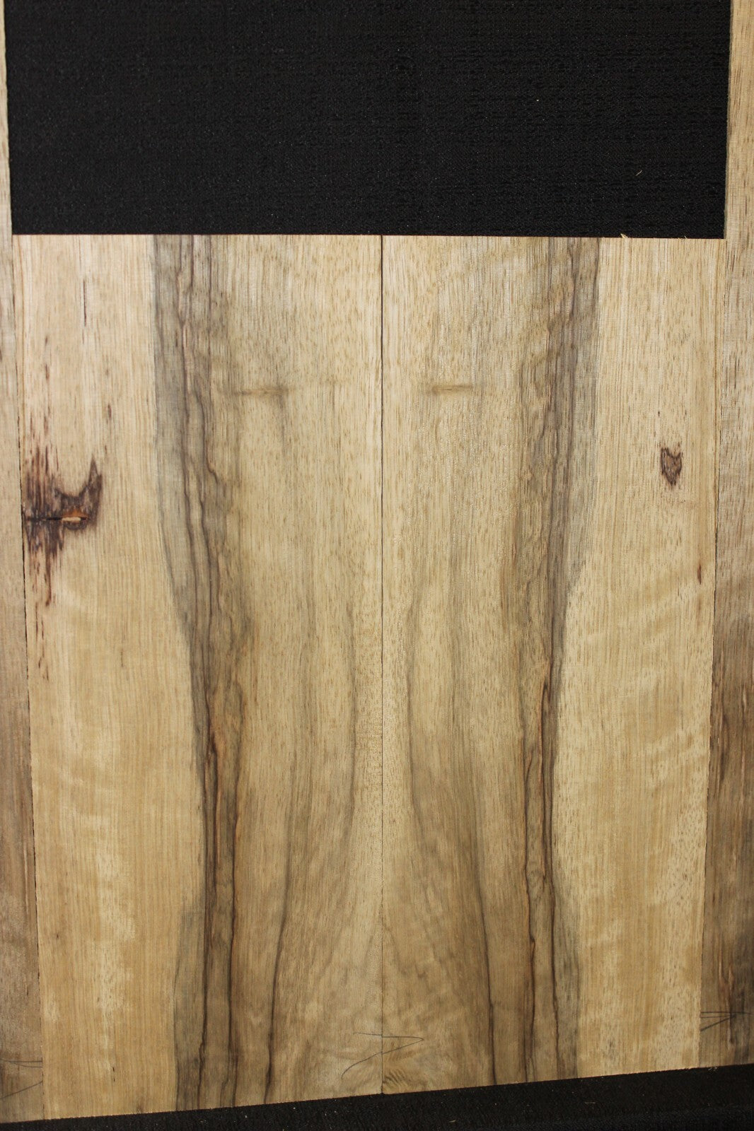 Quarter sawn black limba / korina ukulele back and side set. Tenor size