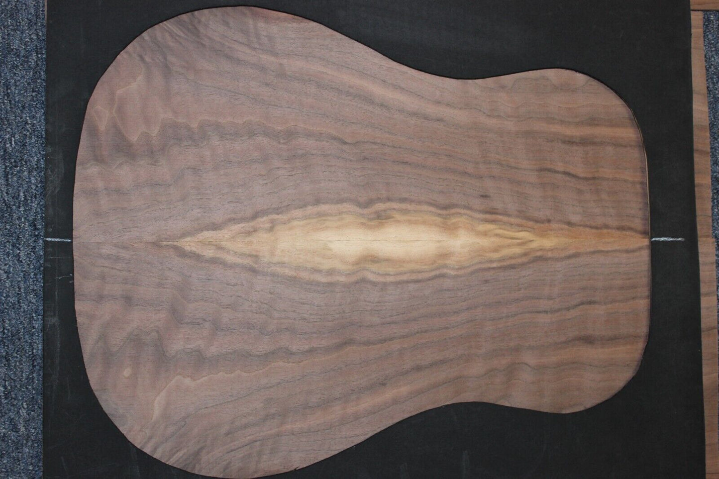 Flame figured black walnut dreadnought size guitar back and side set.