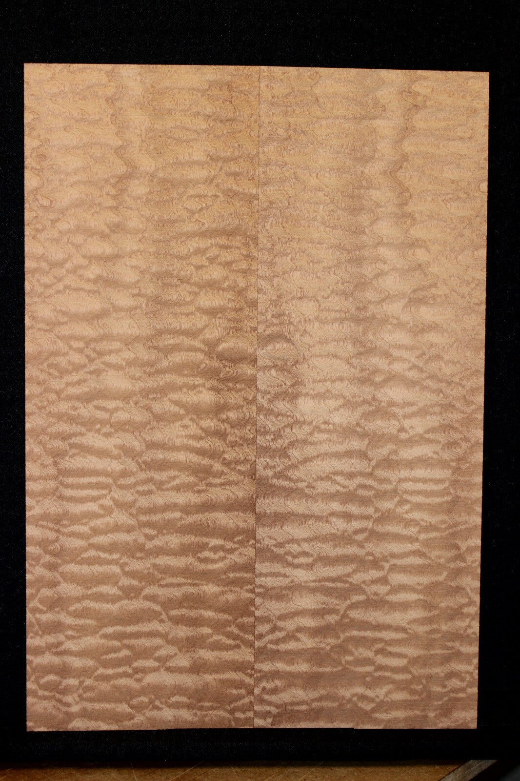 Quilted sapele electric guitar bookmatched drop top. Master grade figure.