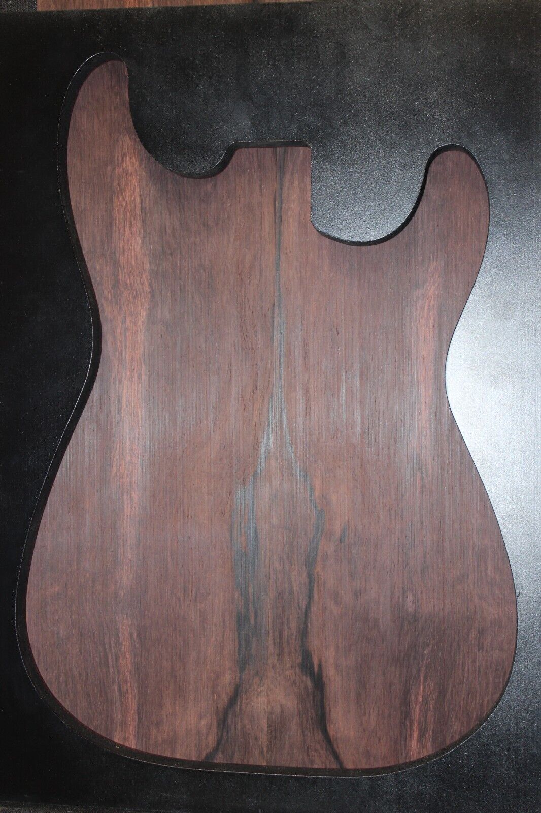 Madagascar rosewood guitar drop top.