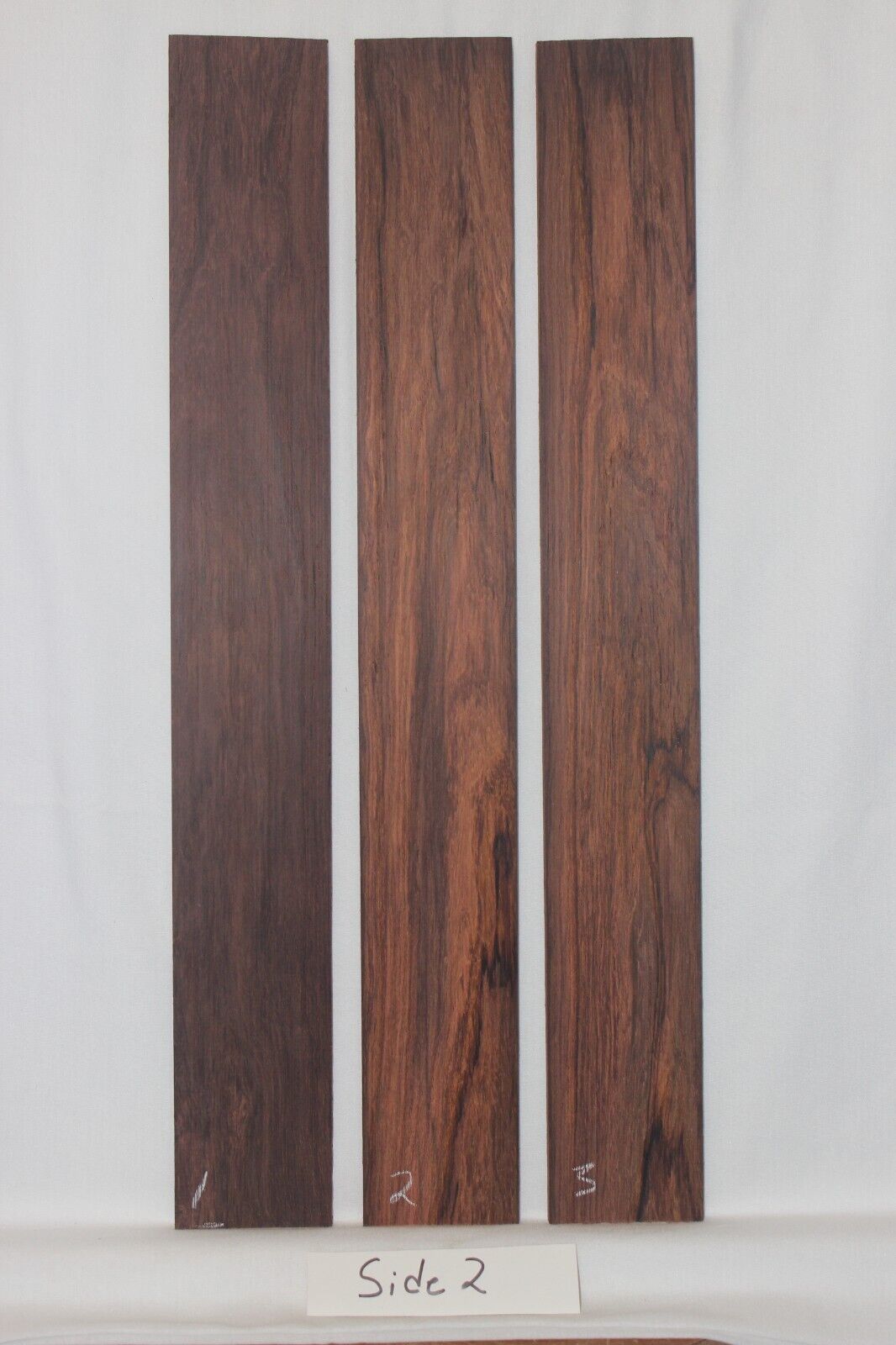 Madagascar rosewood guitar fingerboard blank. Wild color and grain.