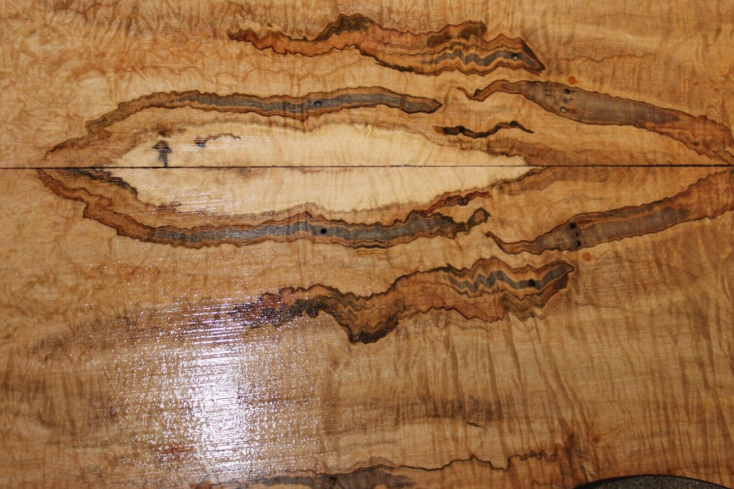 Figured ambrosia maple book matched guitar top. Personal stash set!