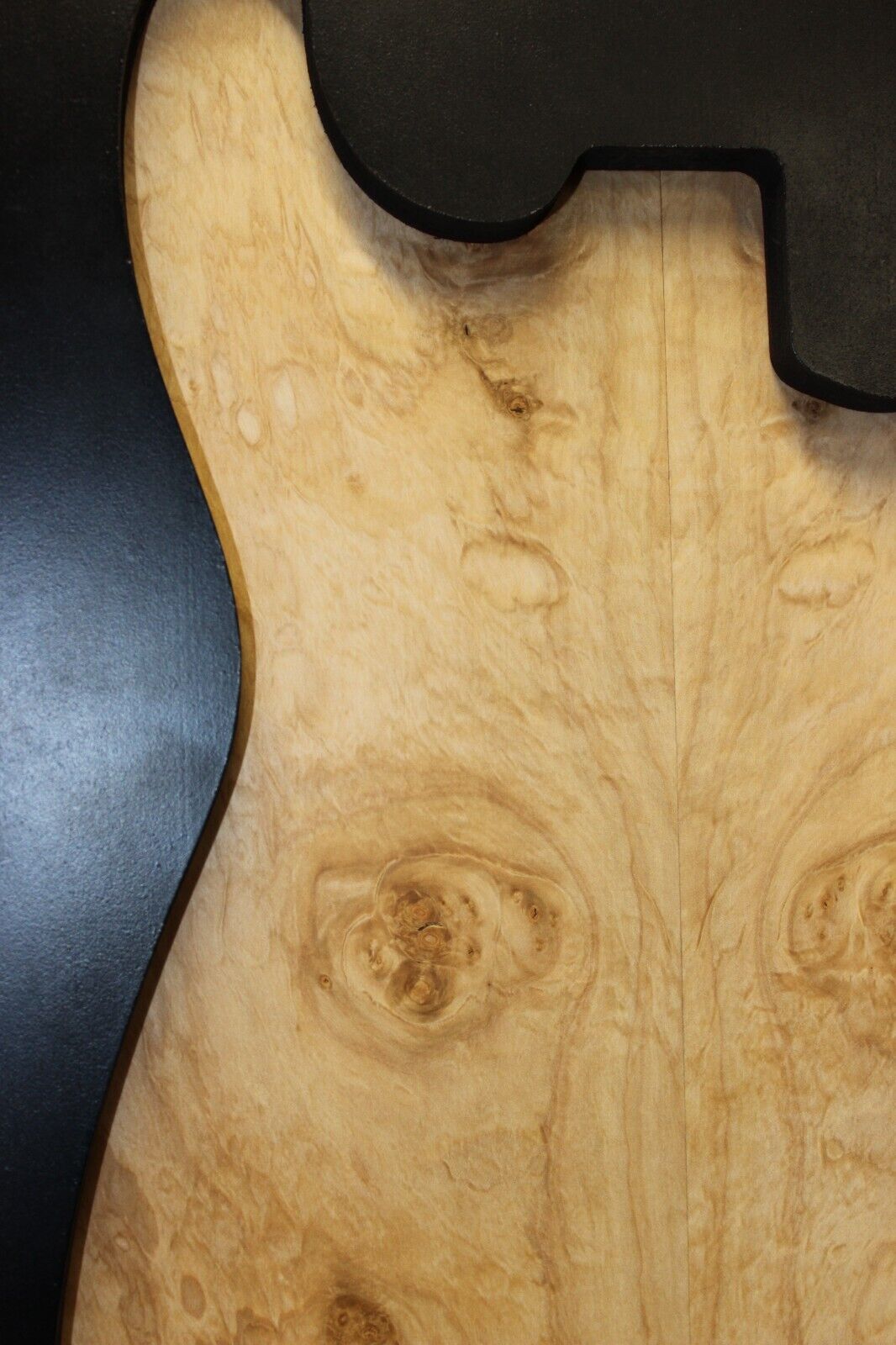 Silver maple, burl / lace figured guitar book matched top.