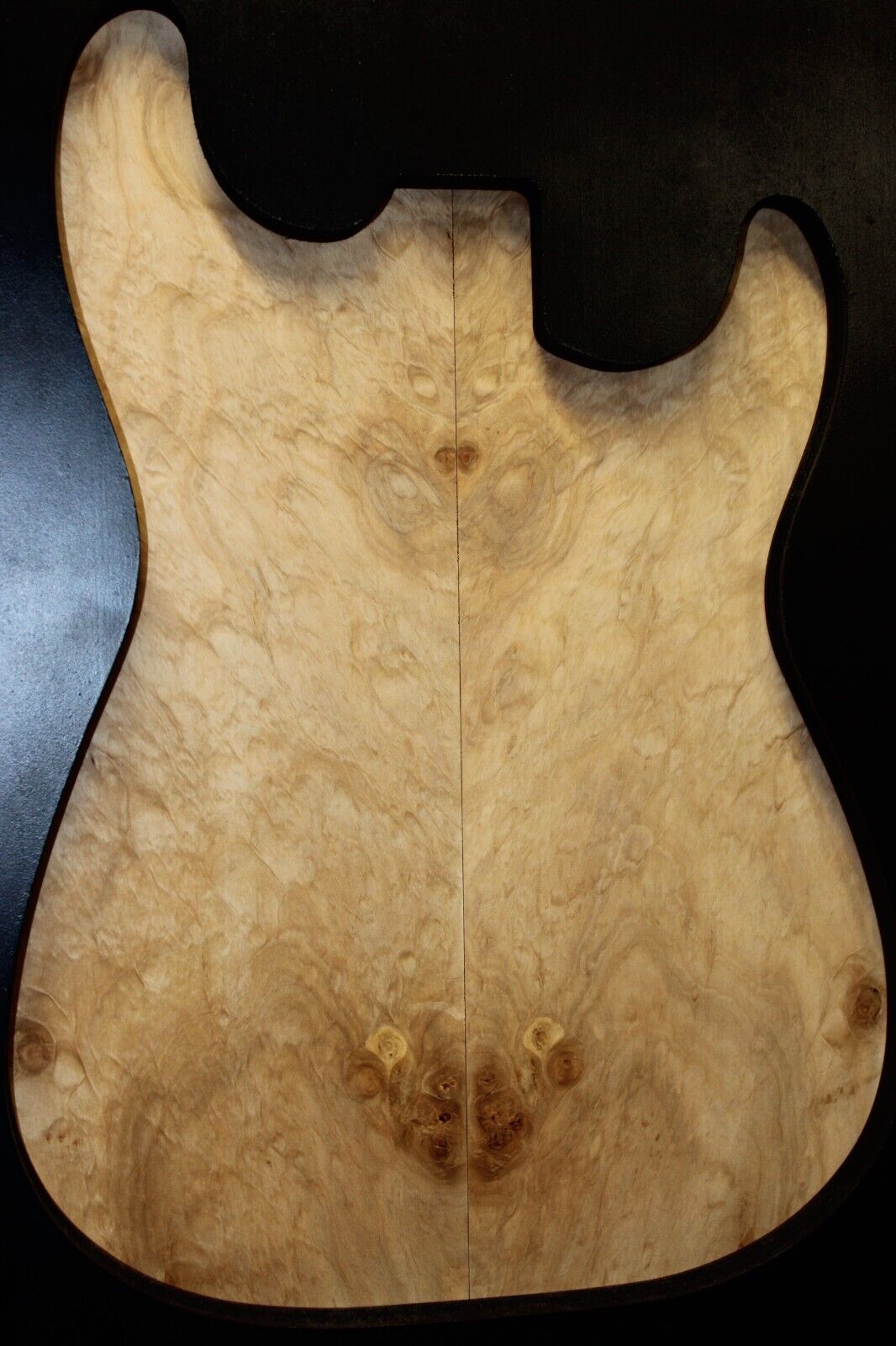 Silver maple, burl / lace figured guitar book matched top.