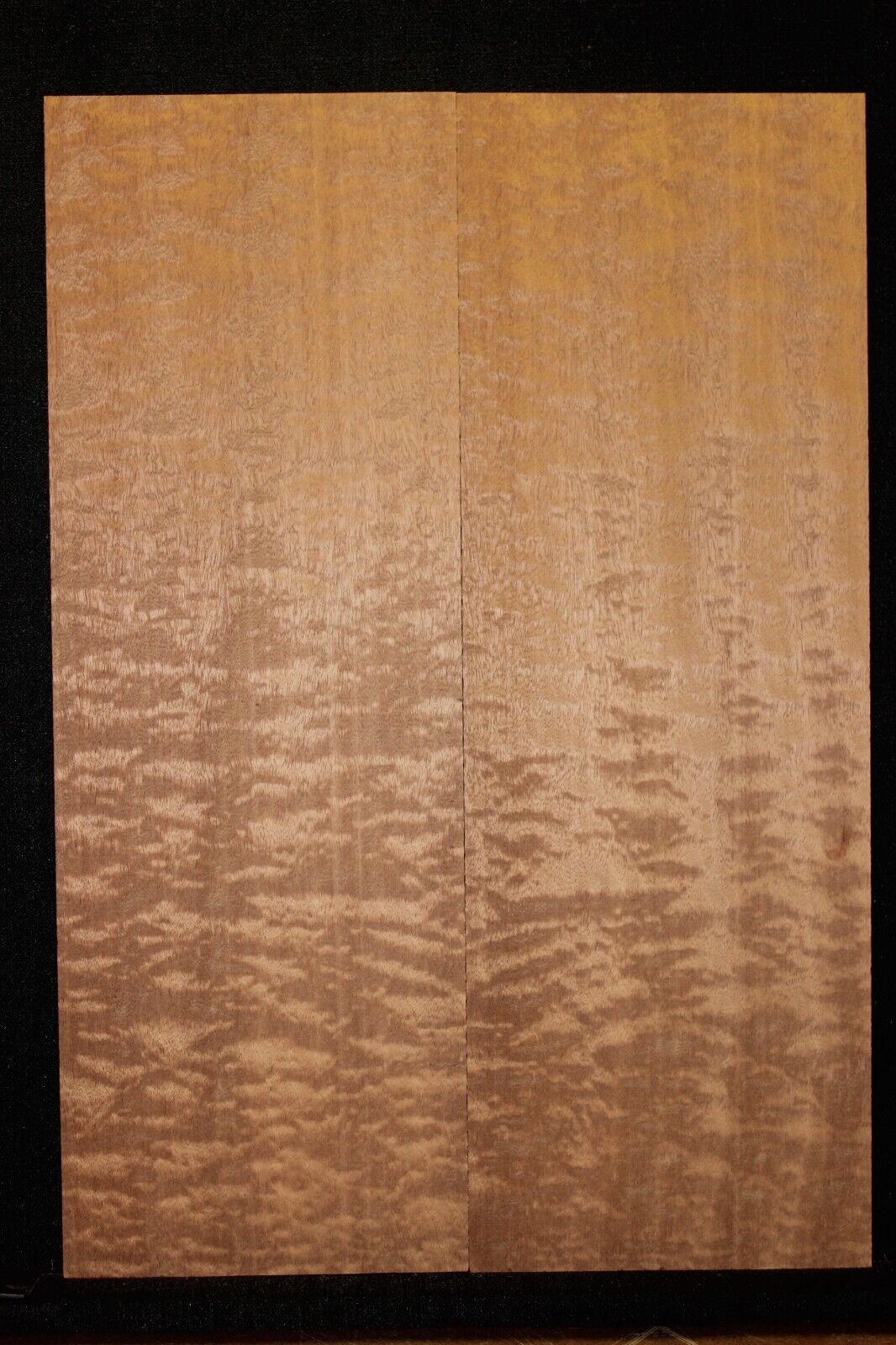 Quilted figured sapele guitar bookmatched drop top.