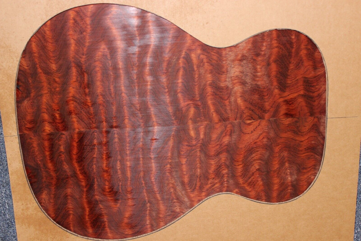 Waterfall figured bubinga back and side set. Stunning grain, color and figure.