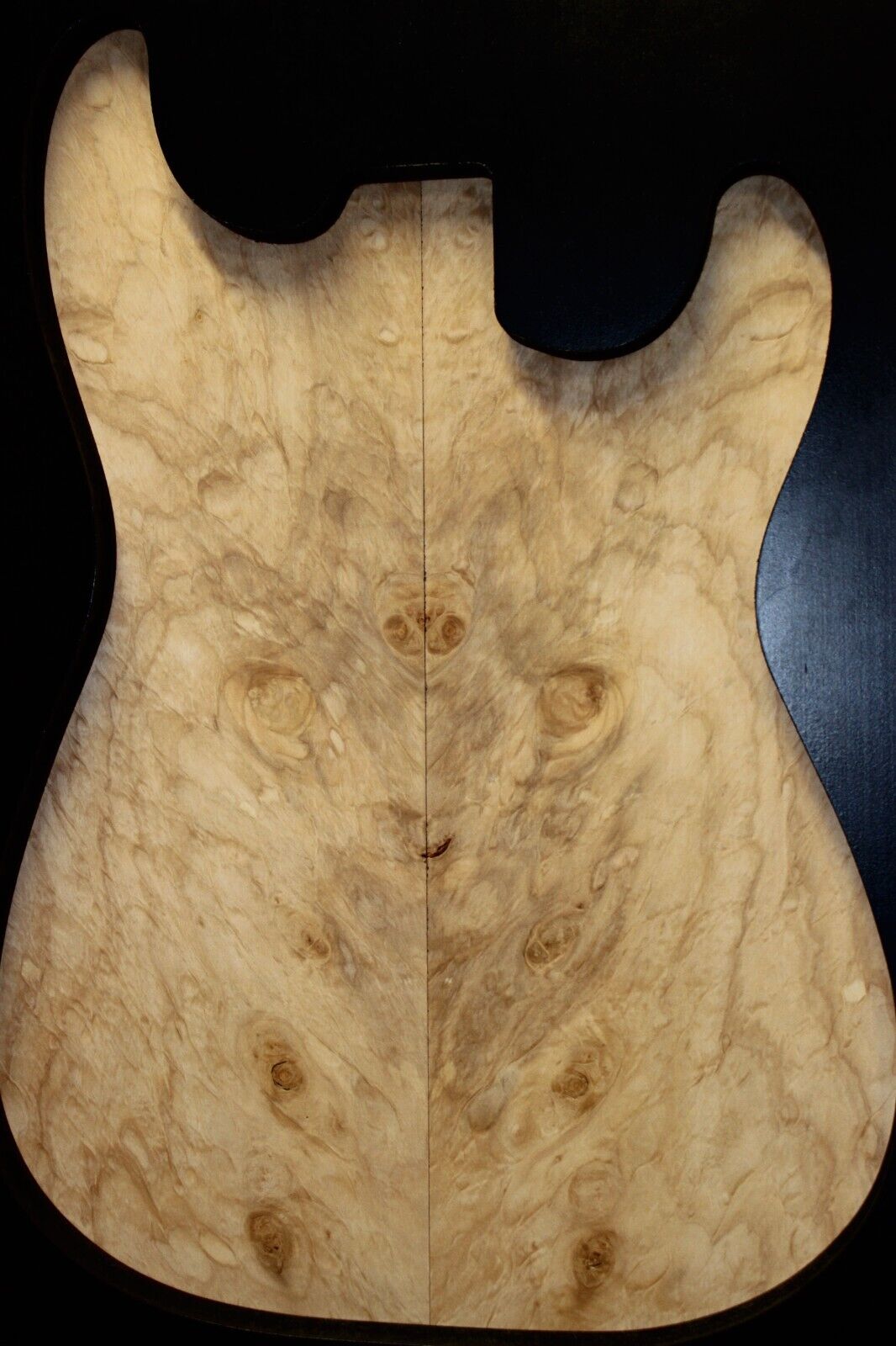 Silver maple, burl / lace figured guitar book matched top.