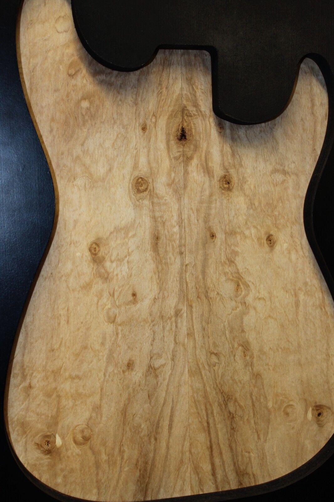 Silver maple, burl / lace figured guitar book matched top.