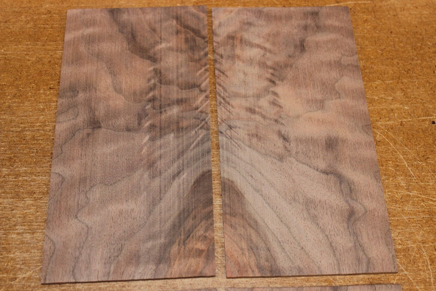 Figured black walnut headstock / peg head veneer. Sold individually