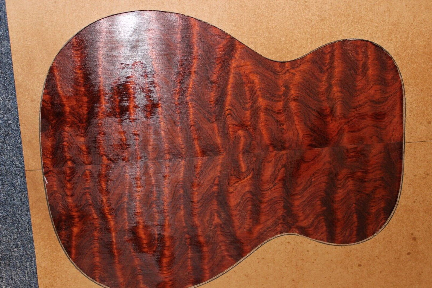 Waterfall figured bubinga back and side set. Stunning grain, color and figure.