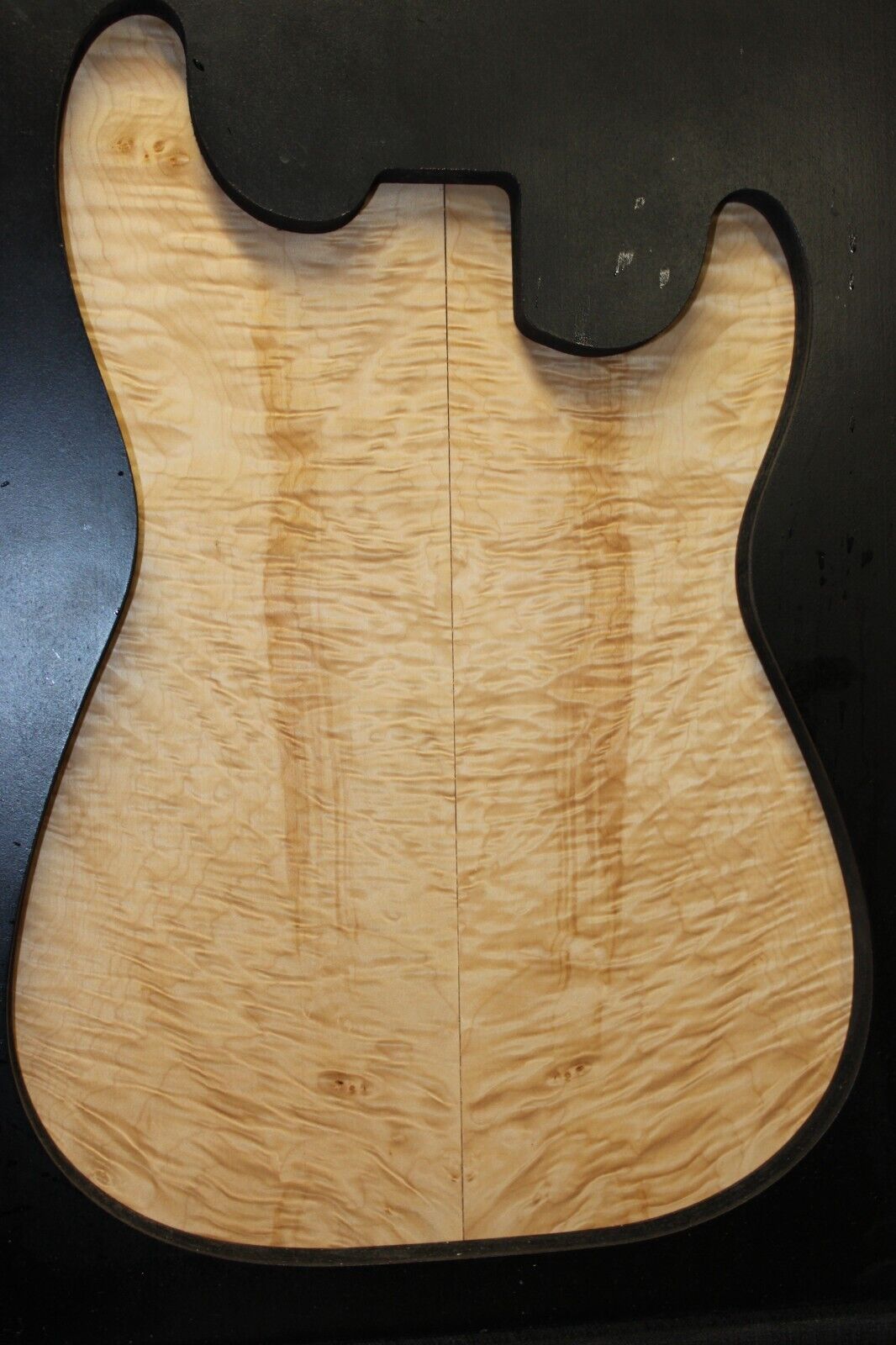 Quilted maple guitar drop top. Nice figure/with minor flaws.
