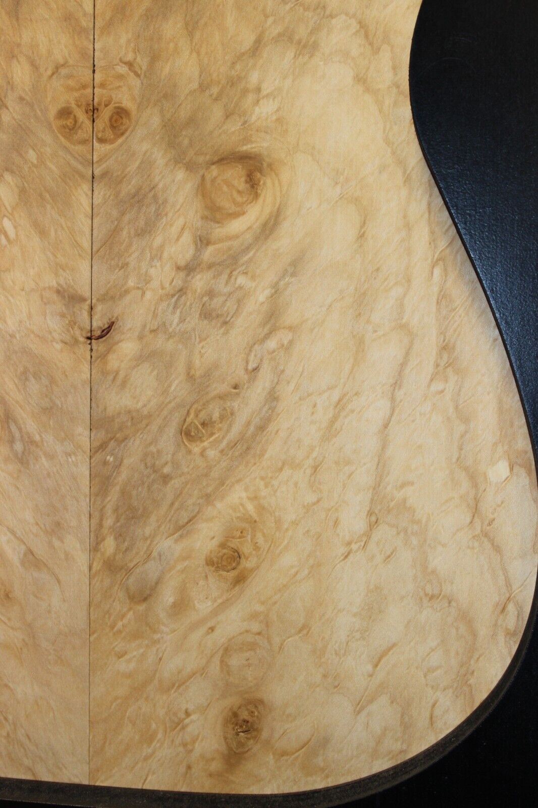 Silver maple, burl / lace figured guitar book matched top.