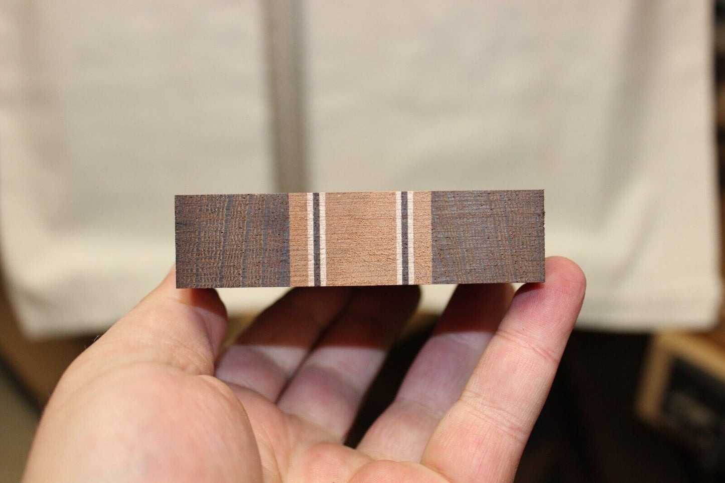 Quilted sapele, wenge and flame maple laminated guitar neck blank.