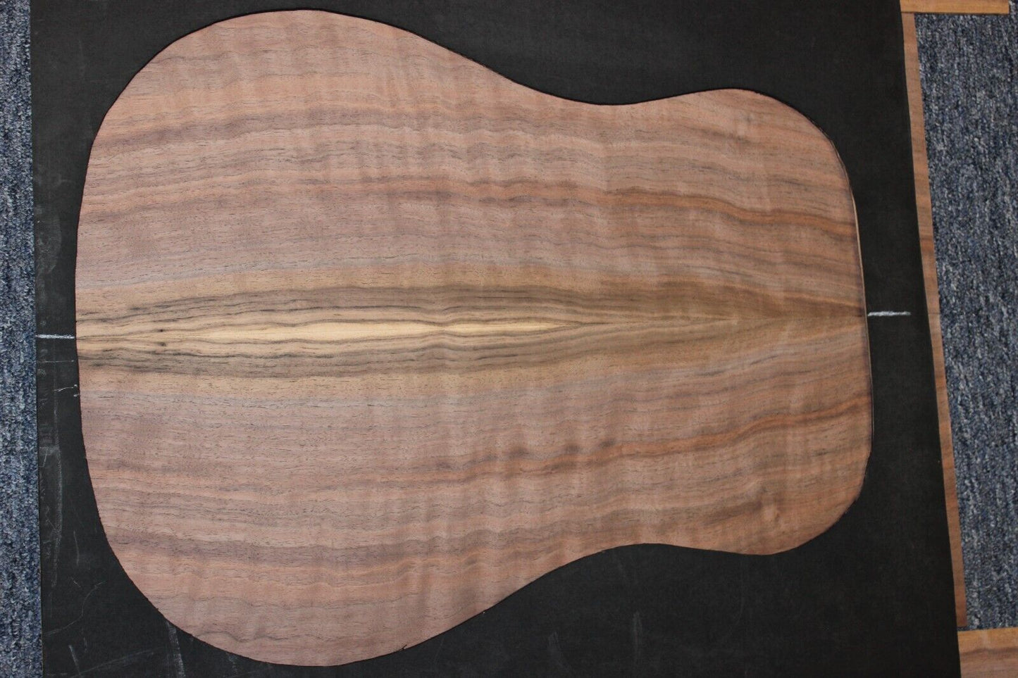Flame figured black walnut dreadnought size guitar back and side set.