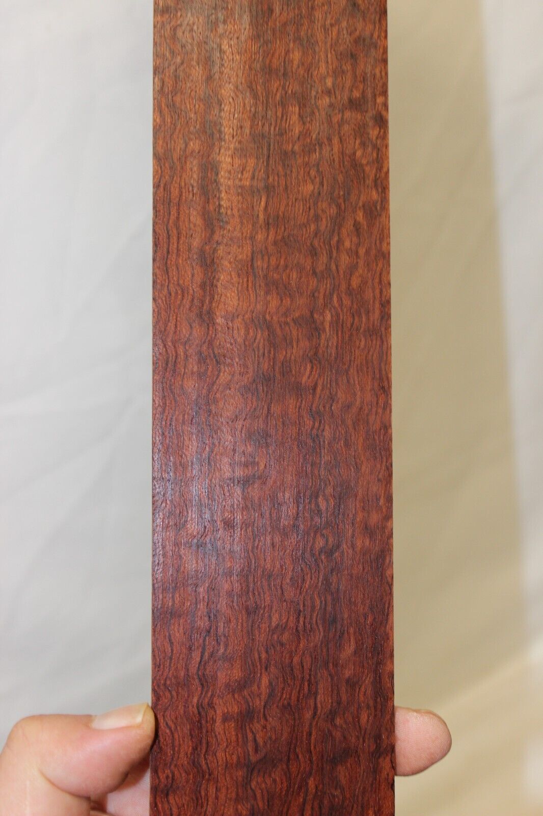 12 inch radius figured bubinga guitar fingerboard blank.