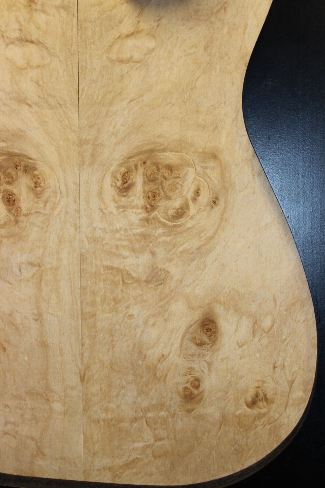 Silver maple, burl / lace figured guitar book matched top.