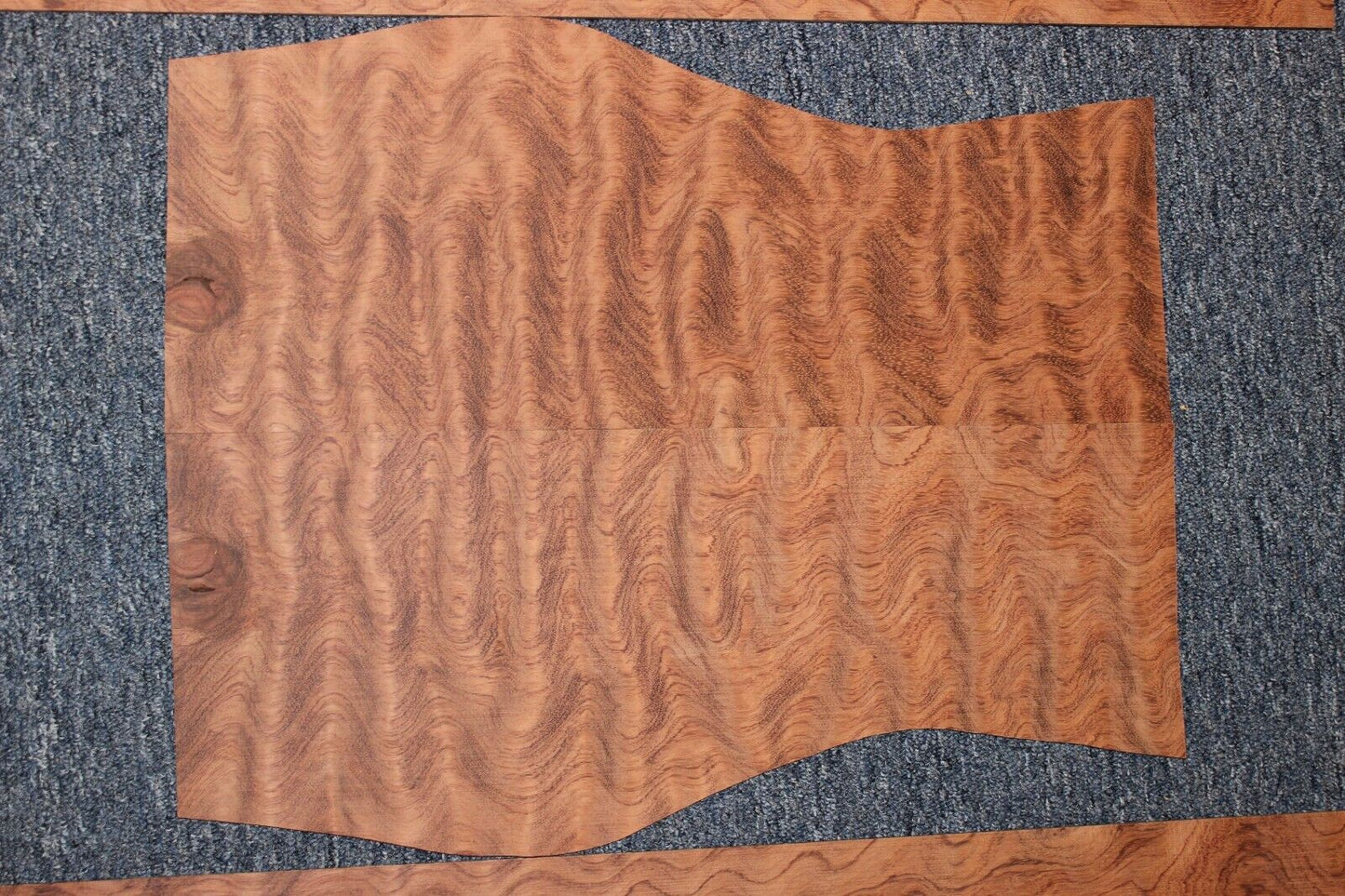 Waterfall figured bubinga back and side set. Stunning grain, color and figure.