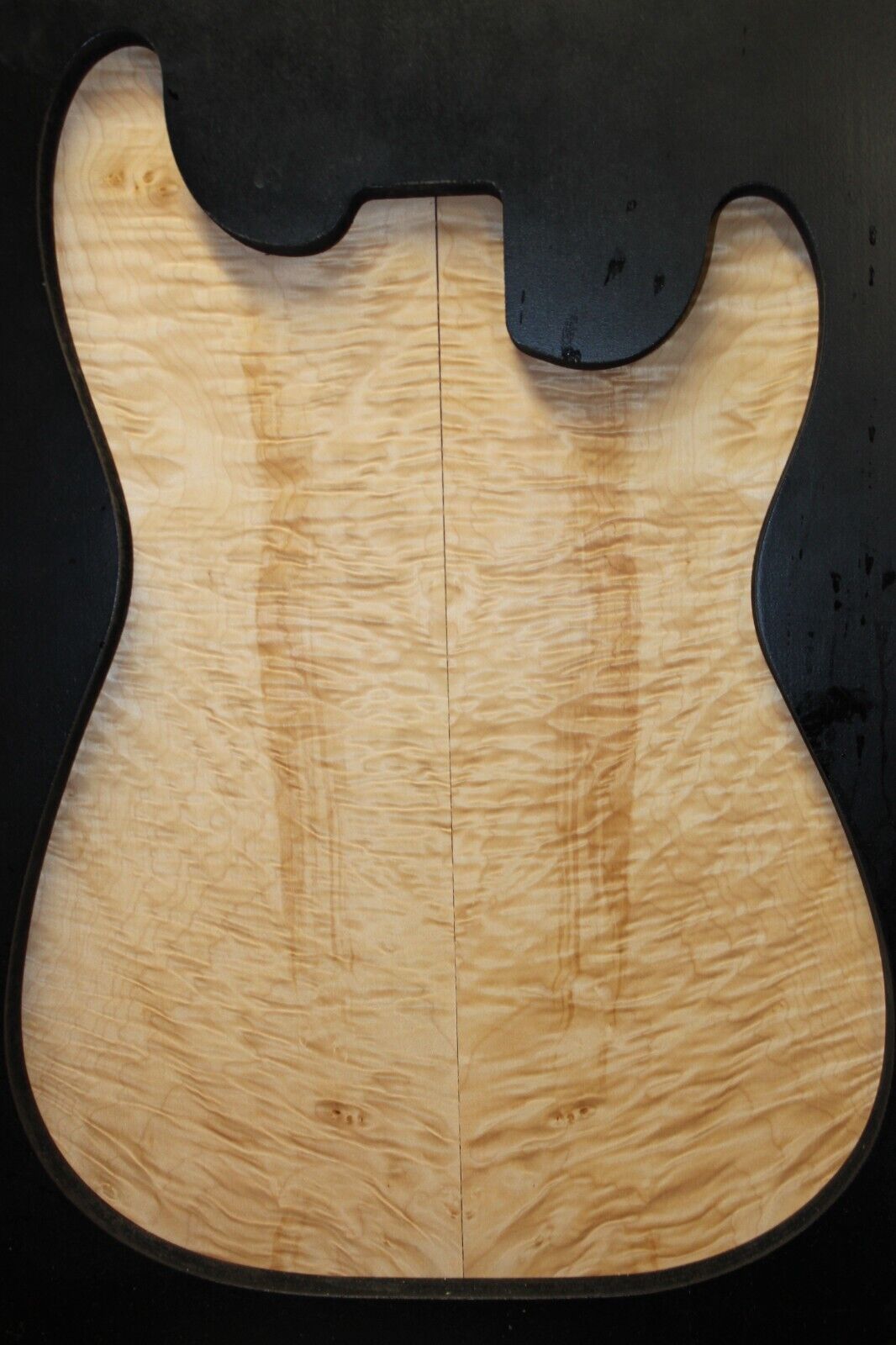 Quilted maple guitar drop top. Nice figure/with minor flaws.