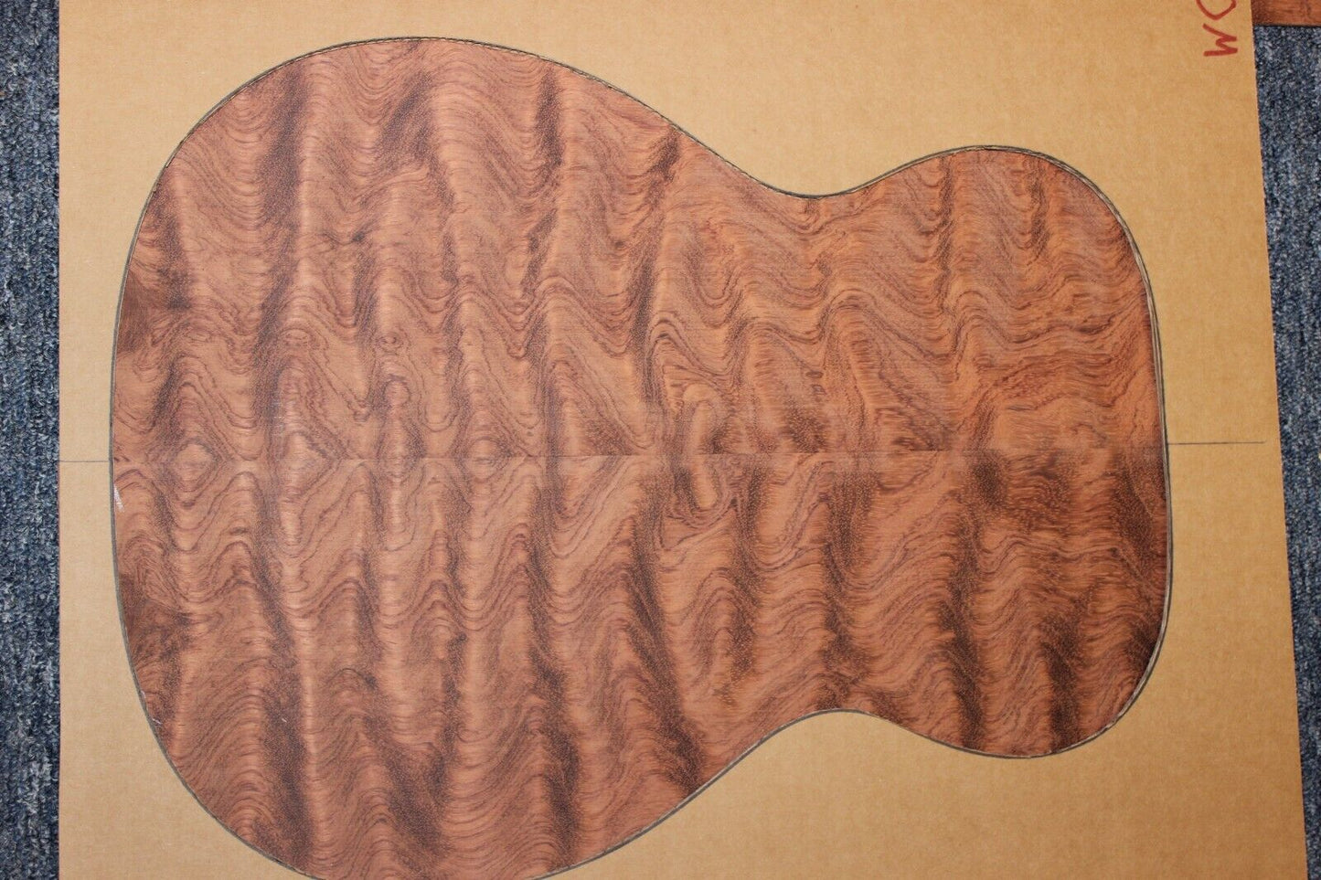 Waterfall figured bubinga back and side set. Stunning grain, color and figure.