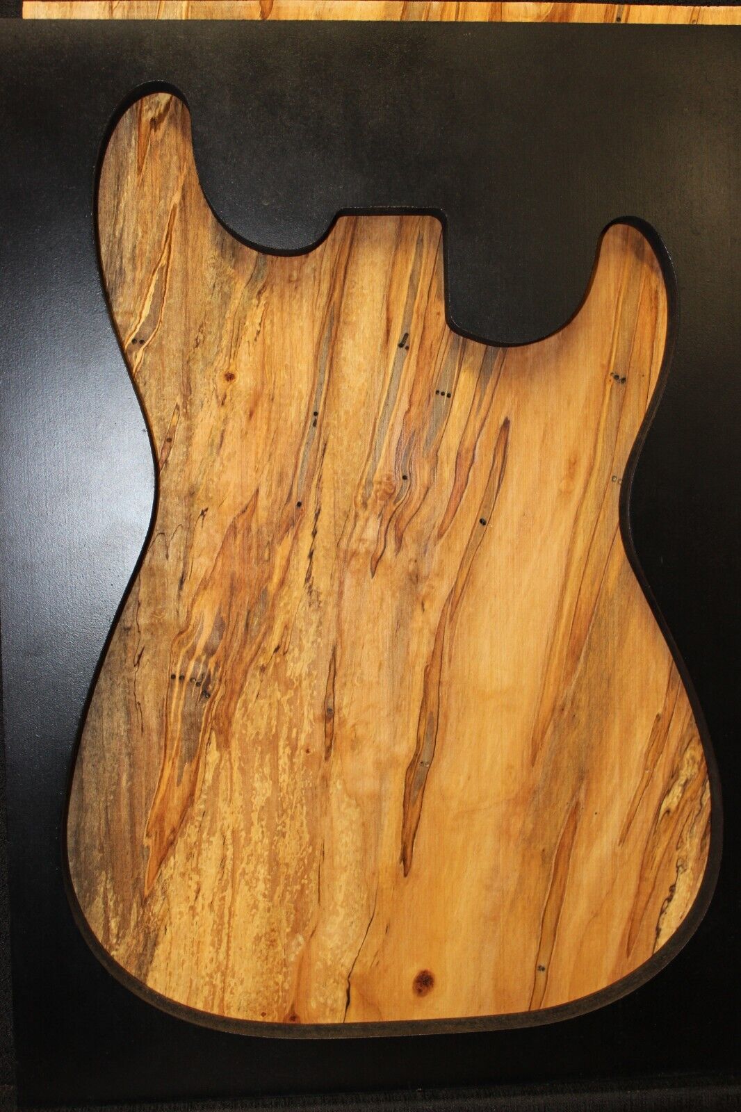 Spalted ambrosia maple one piece guitar top.