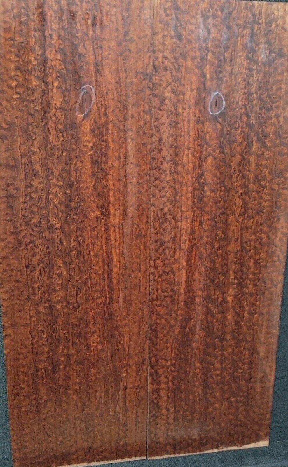 Pomelle figured bubinga electric guitar drop top.