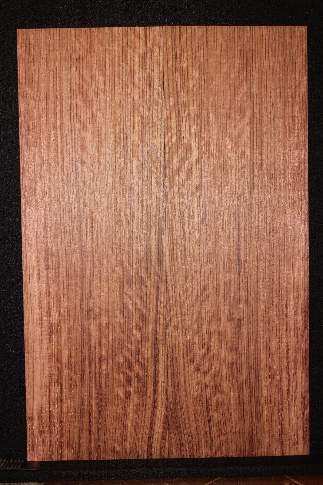 Figured quarter sawn bubinga guitar drop top.