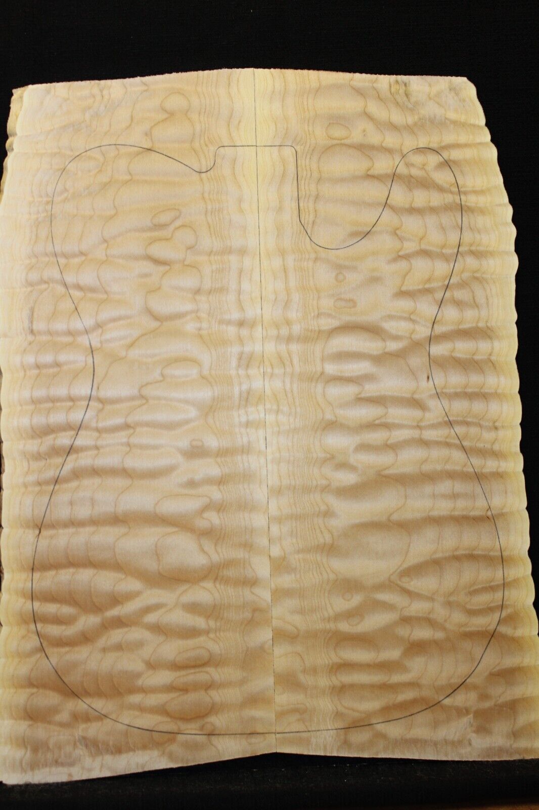 Quilted maple book matched guitar drop top. 5A figure, telly size