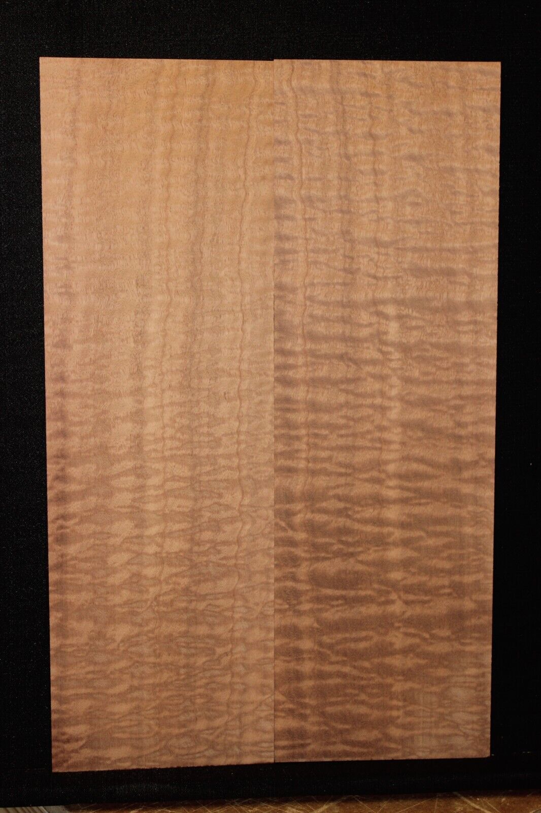 Quilted figured sapele guitar bookmatched drop top.