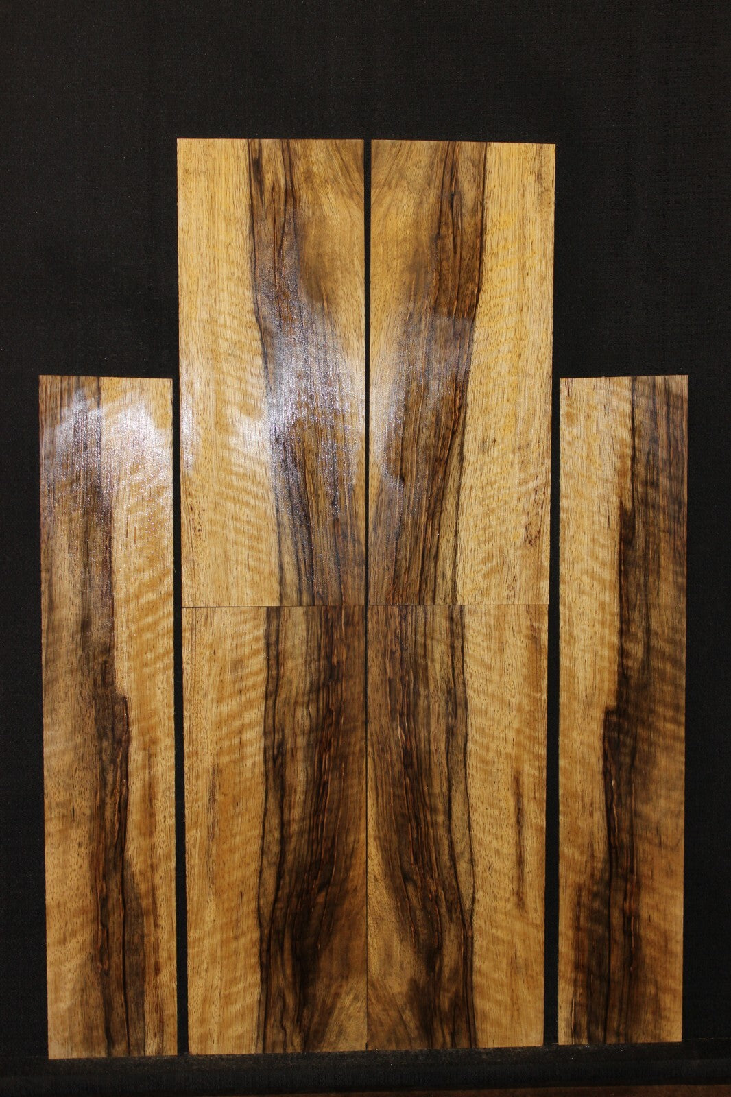 Quarter sawn figured black limba ukulele back, top and side set. Tenor size