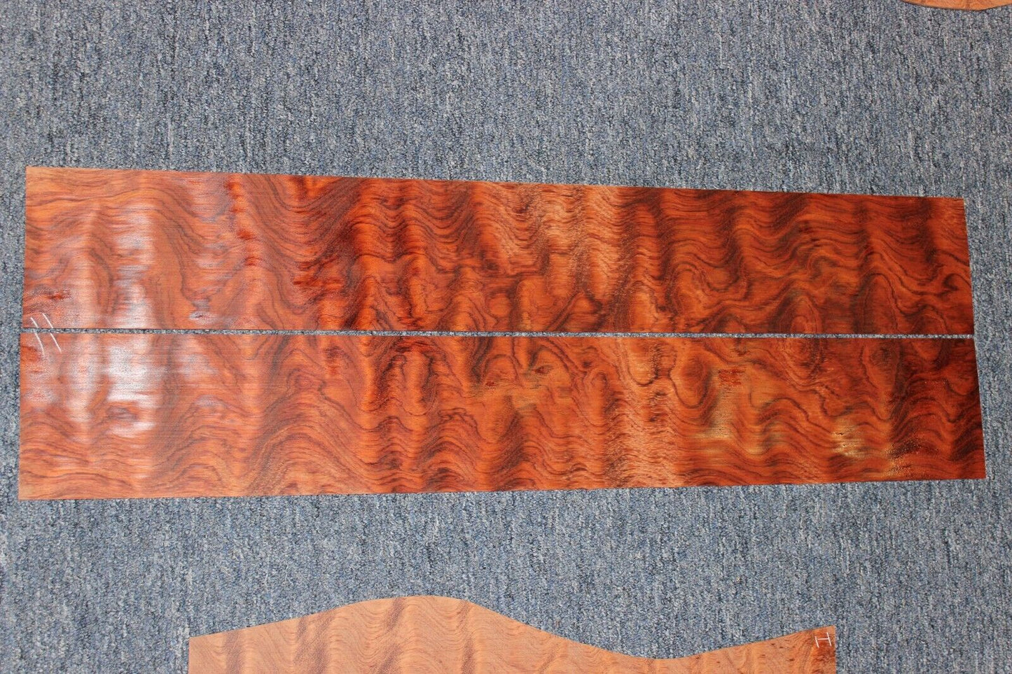 Waterfall figured bubinga back and side set. Stunning grain, color and figure.