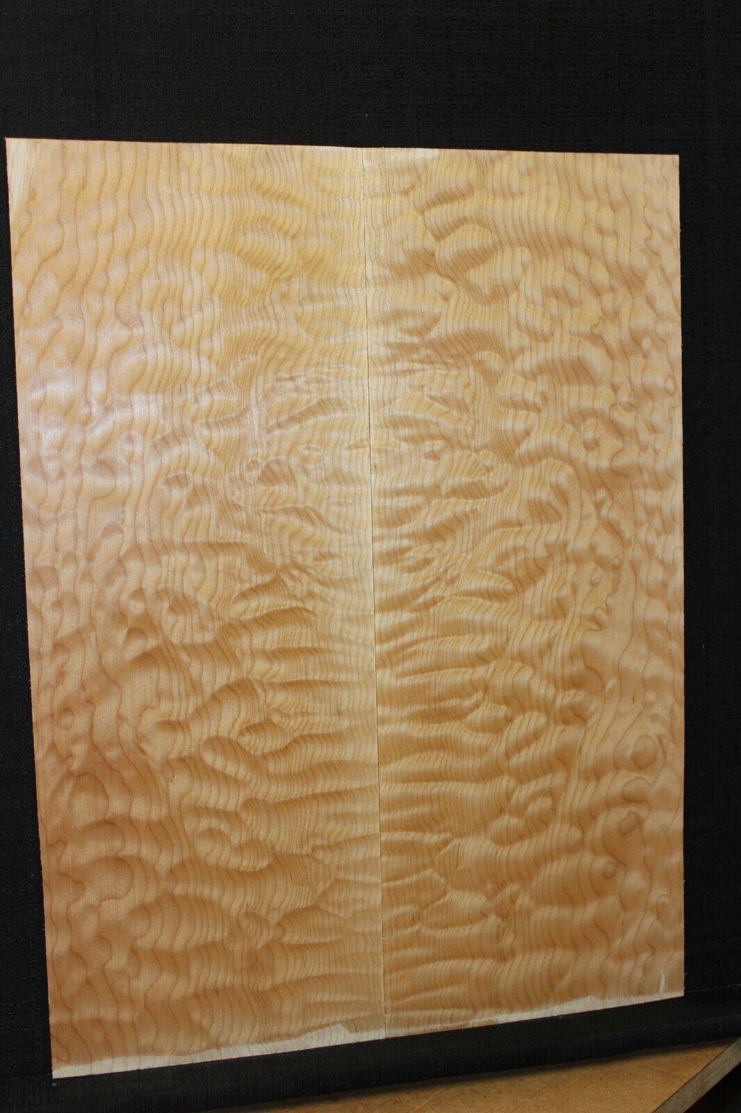 Quilted maple book matched guitar drop top.